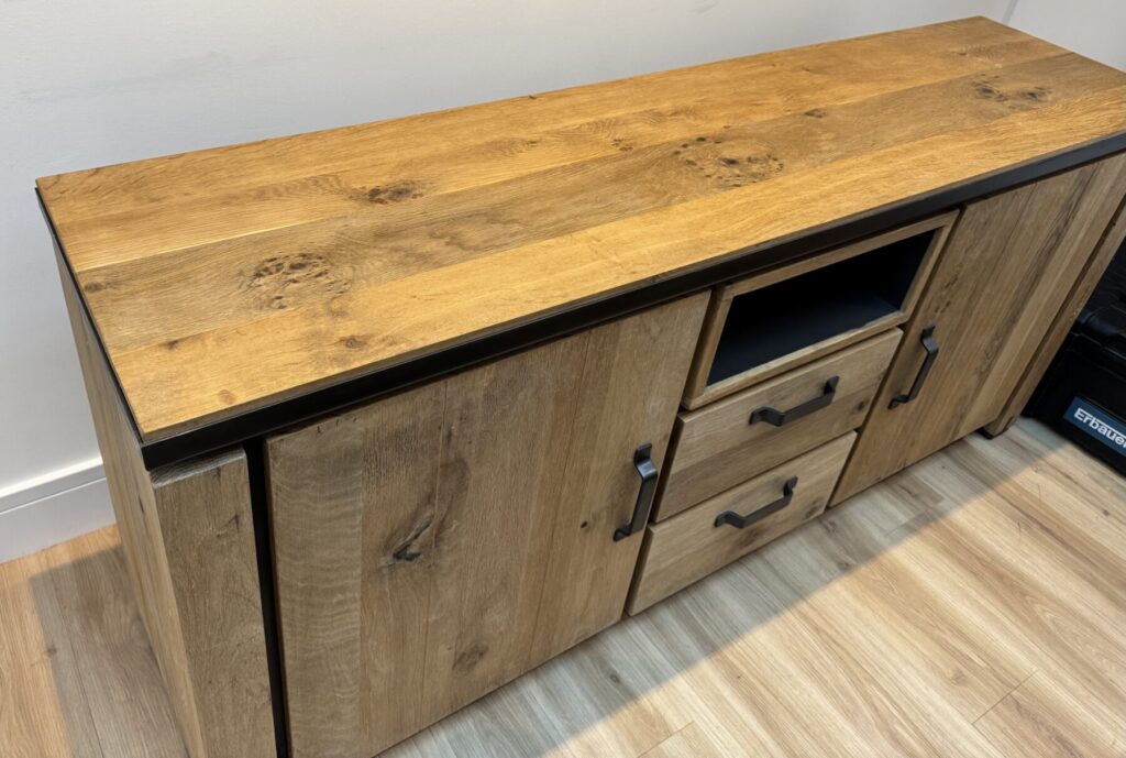 Rustic oak-effect sideboard with drawers and cupboards professionally repaired and restored.